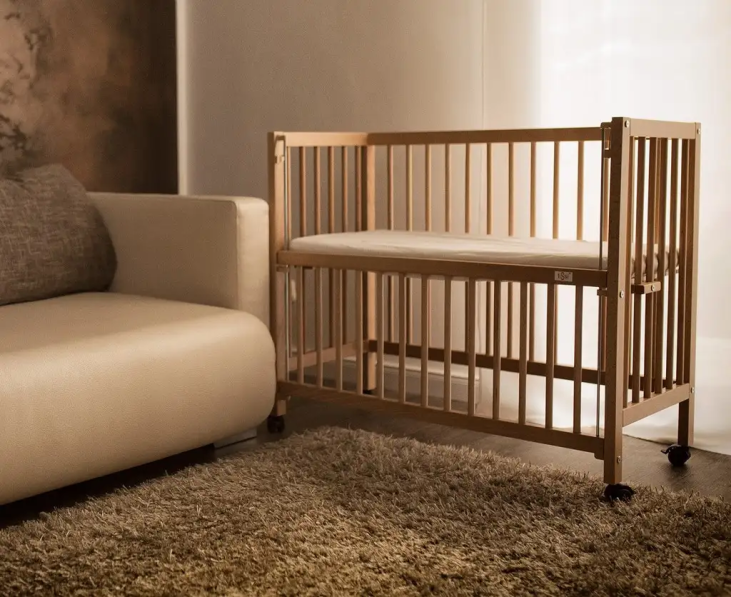 cododo en bois de hêtre réglable en hauteur évolutif en lit bébé